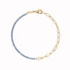 Half link chain half tennis bracelet with blue cubic zirconia gemstones in gold vermeil