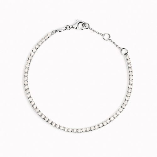 Cubic Zirconia tennis bracelet with white stones in sterling silver on white background