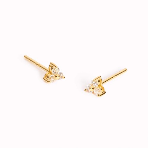 Gold stud earrings with gemstones arranged in a flower pattern