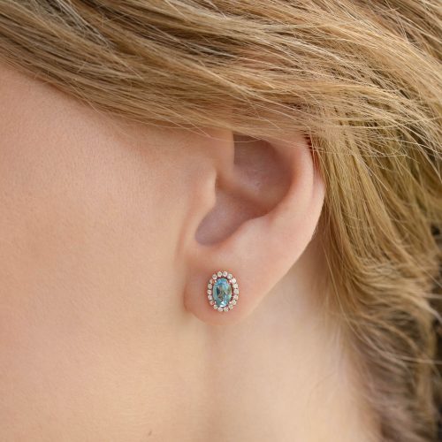 Taralynn 1 swiss blue topaz halo earring 14k model 0130 edit final schnell RG edit ltr cropped 08f7aa39 0664 4174 a82d 9beaad856ab6