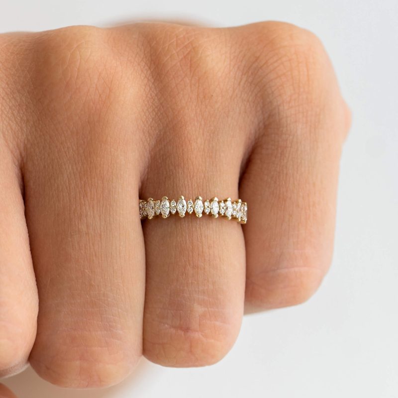 Marquise and round diamond ring in solid gold